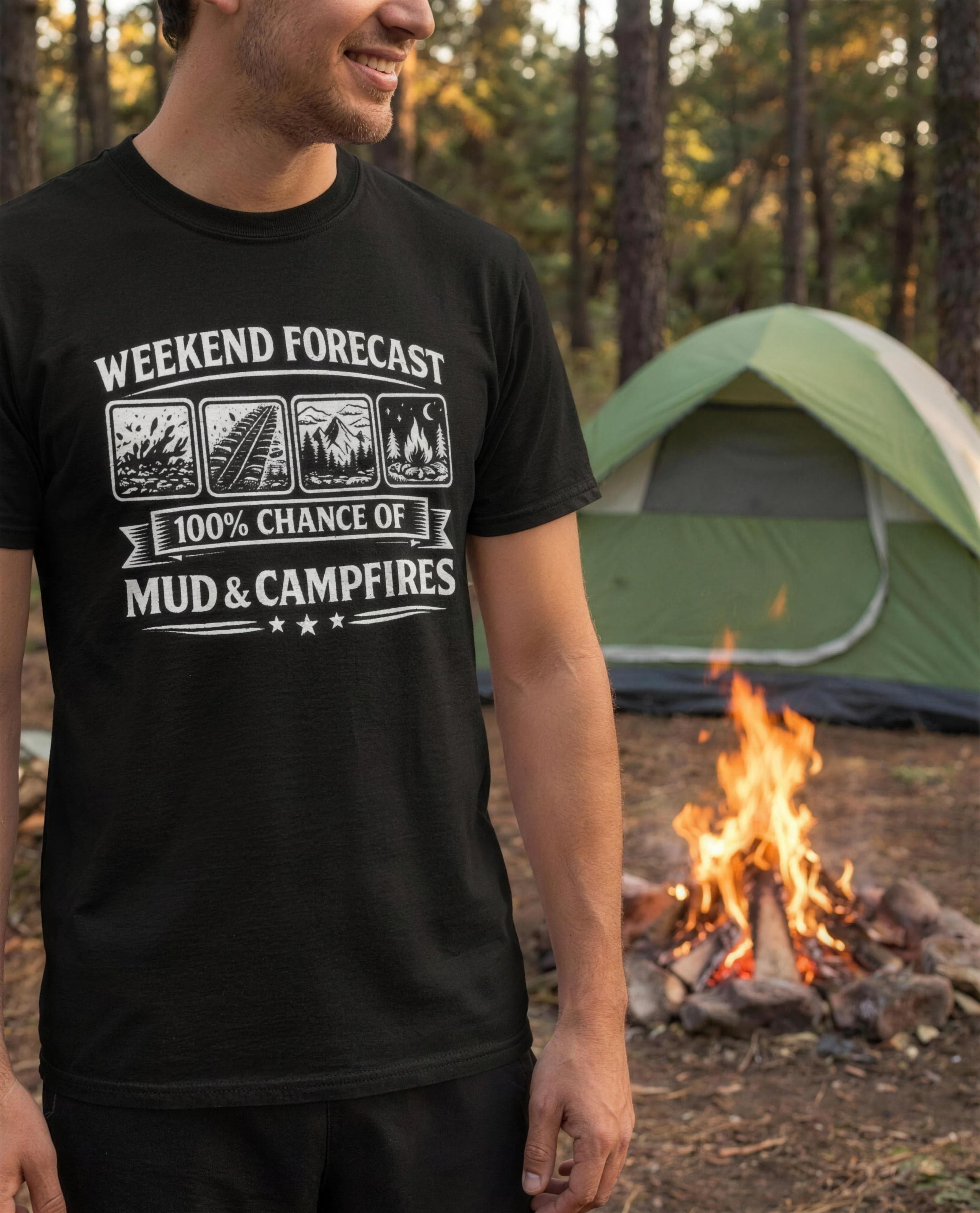 Weekend Forecast: Mud and Campfires tee worn around a campfire